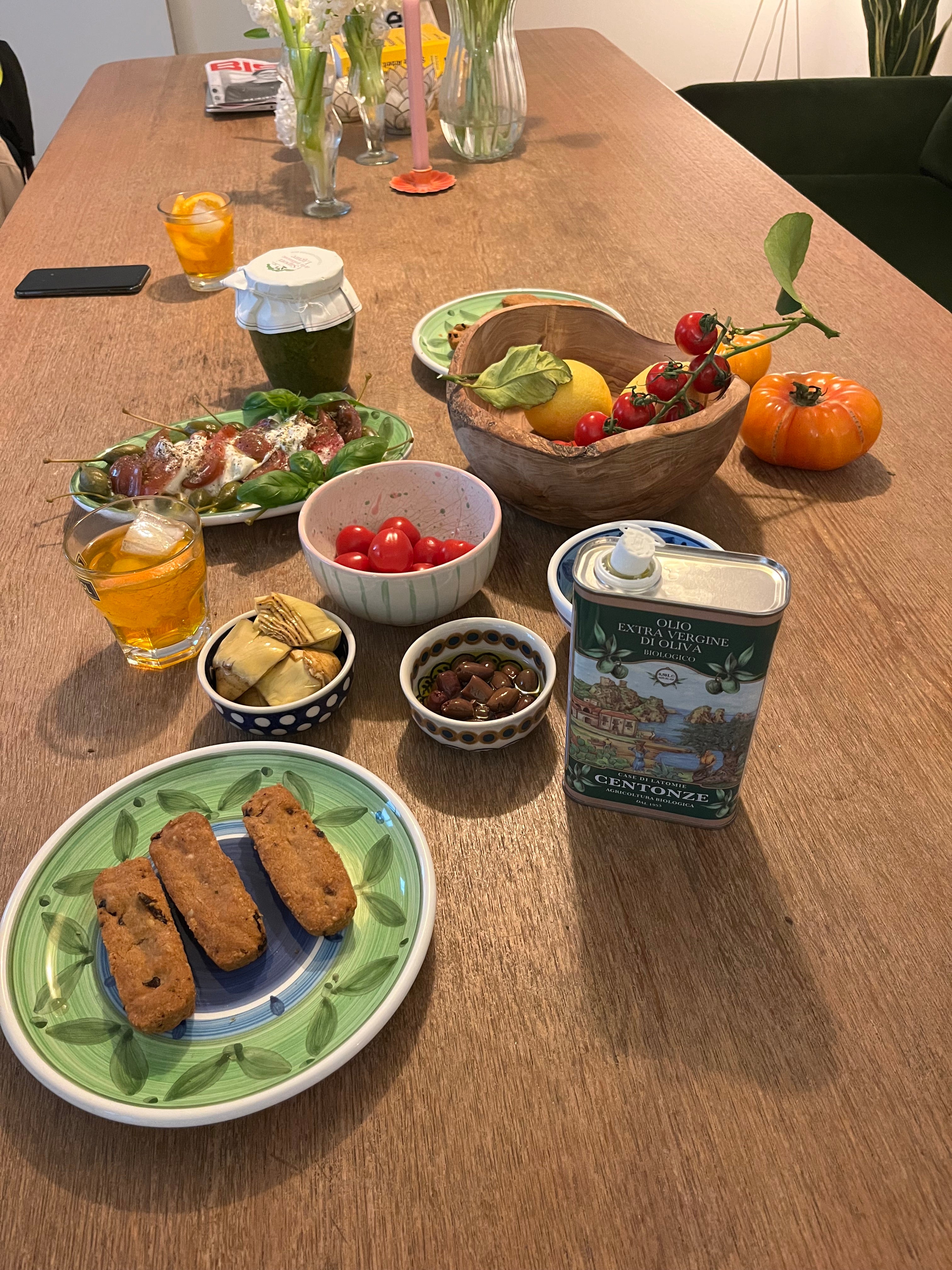 Mediterranean table with tomatoes, olives and olive oil